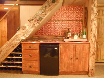 Staircase bar, using the space beneath the stairs