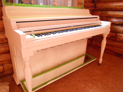 white painted piano